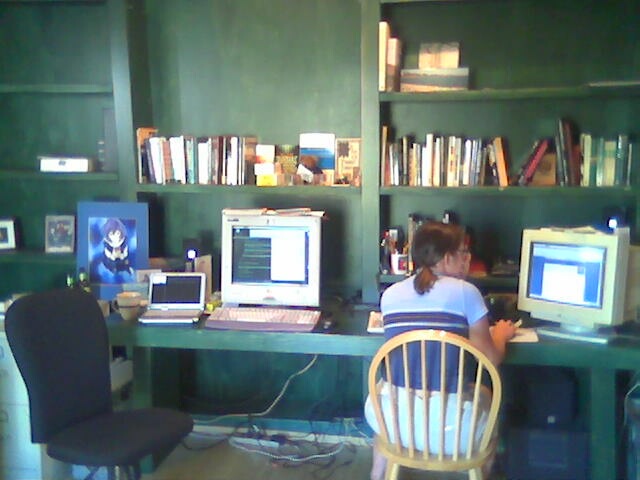 Erin at the workbench in my bedroom.