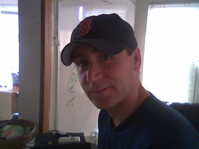 Bryan, on one of his recent trips to San Diego, chilling on the barstool at  my old house in P.B.