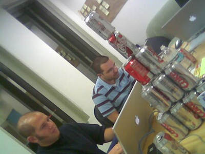 Matt, Rich, and March 2005 Camp Tomo's Pyramid of Coke Cans
