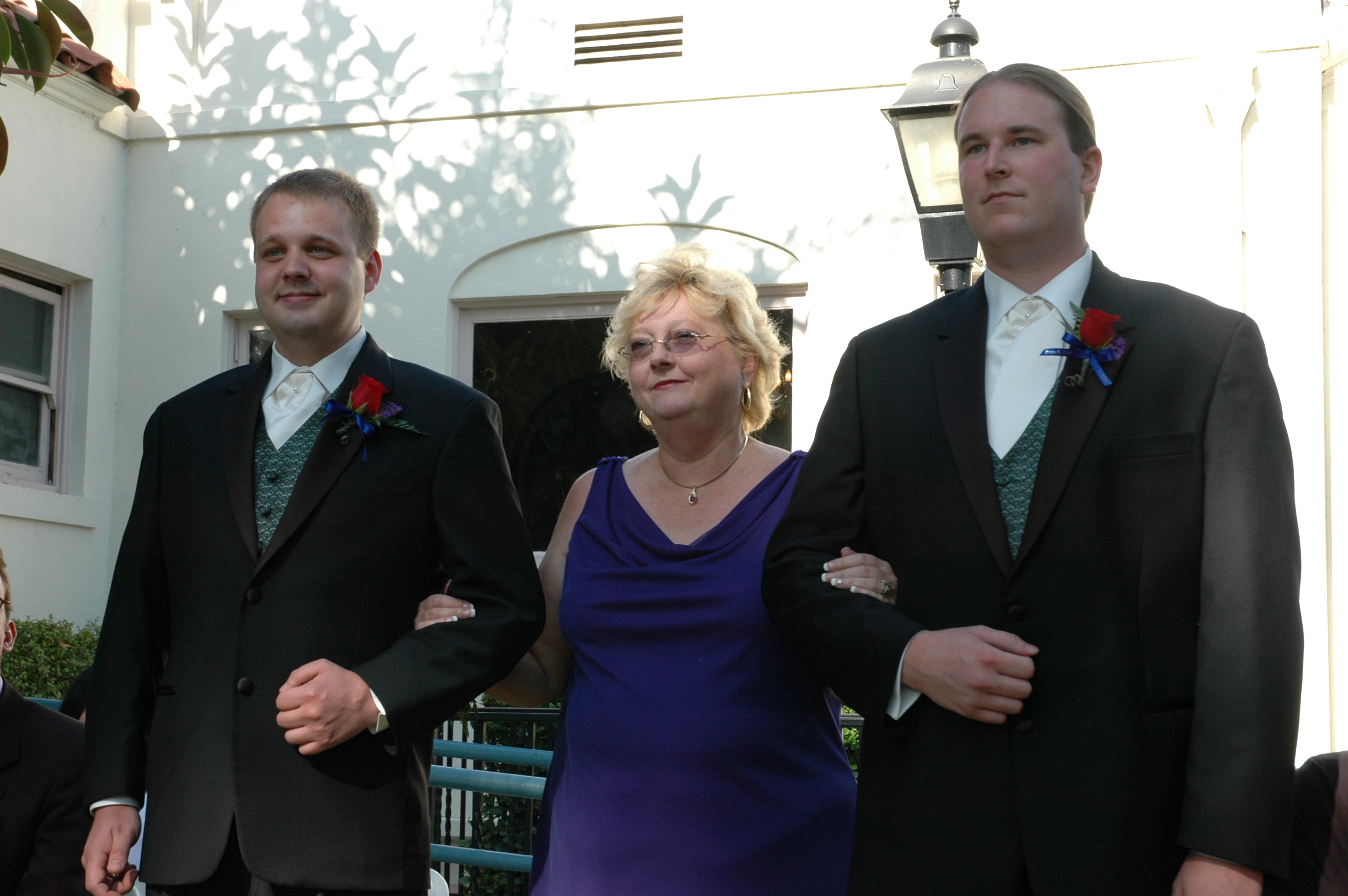 Mom, escorted by Colin and Dan