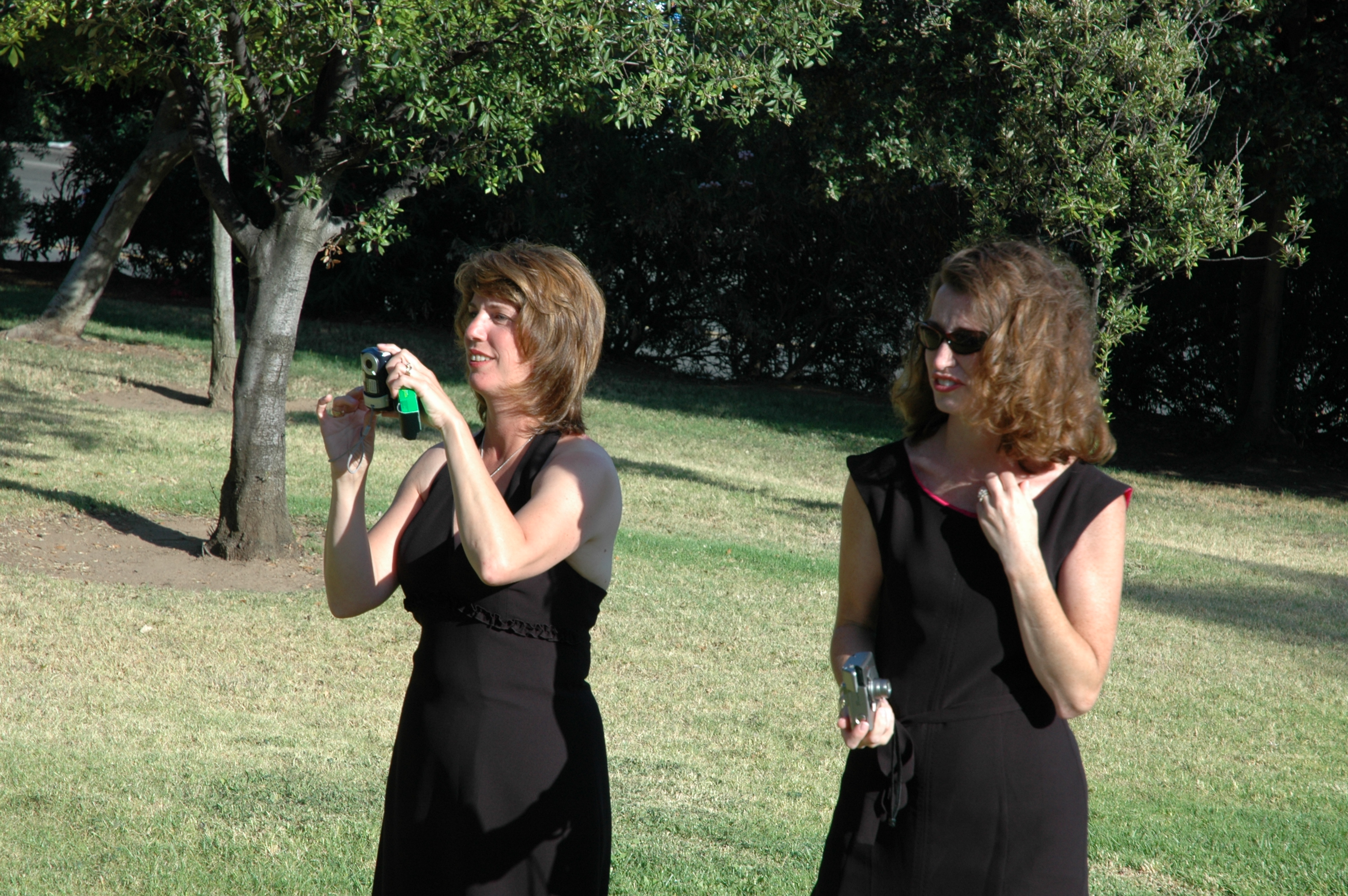 Barbara & Maura take photos (presumably of Colleen & Roger)