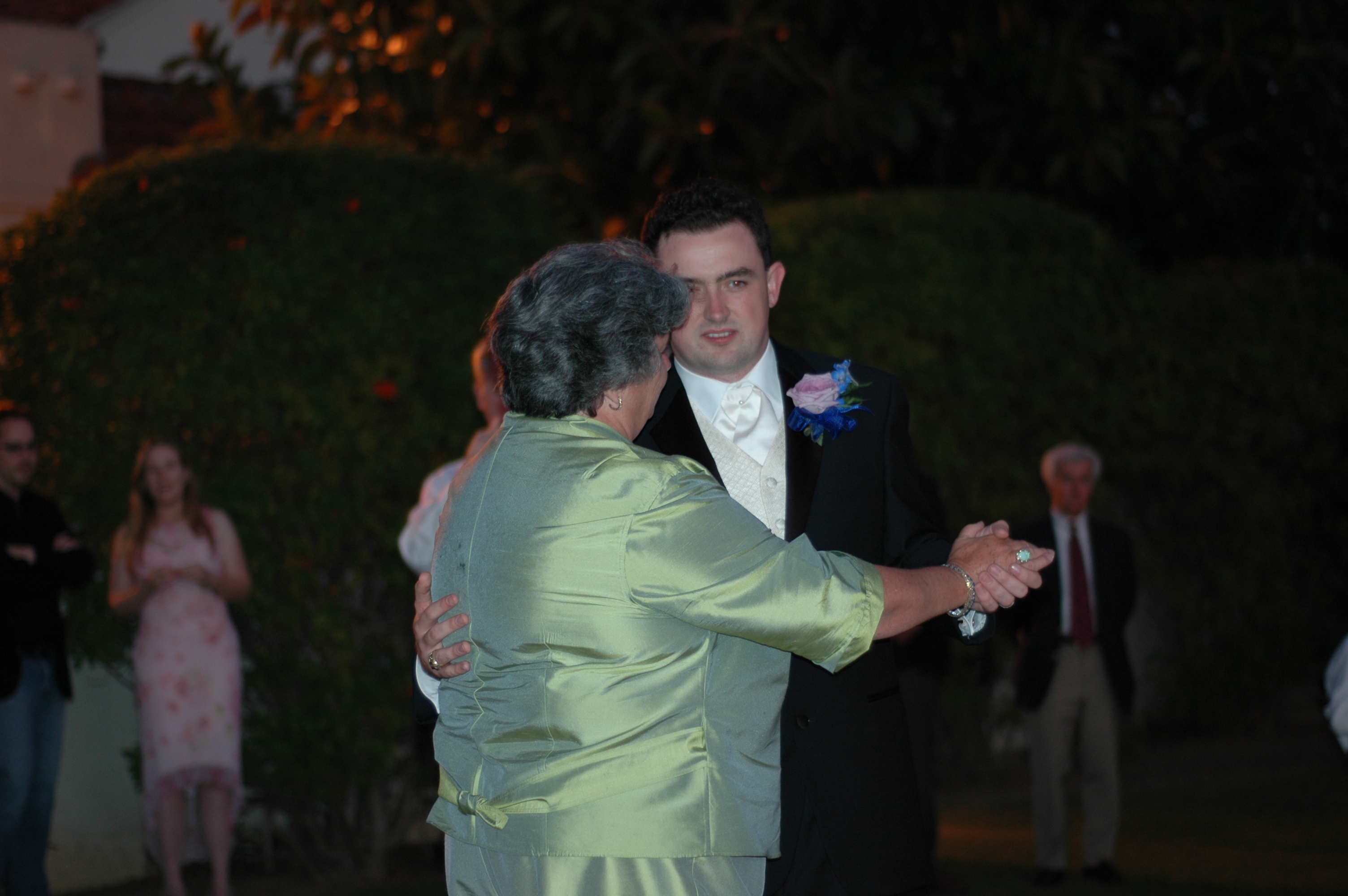 Ted dances with his mom