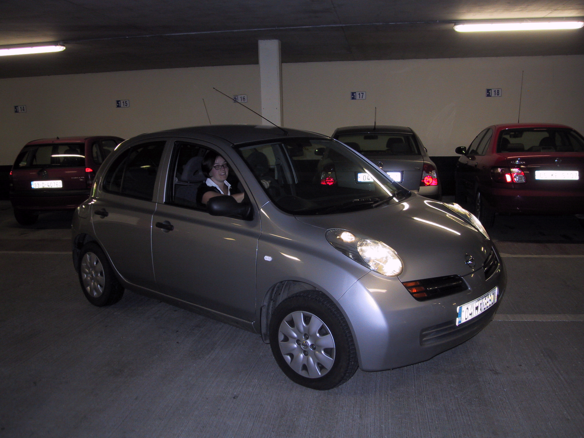 Erin, in our rental car in a parking garage in Galway City