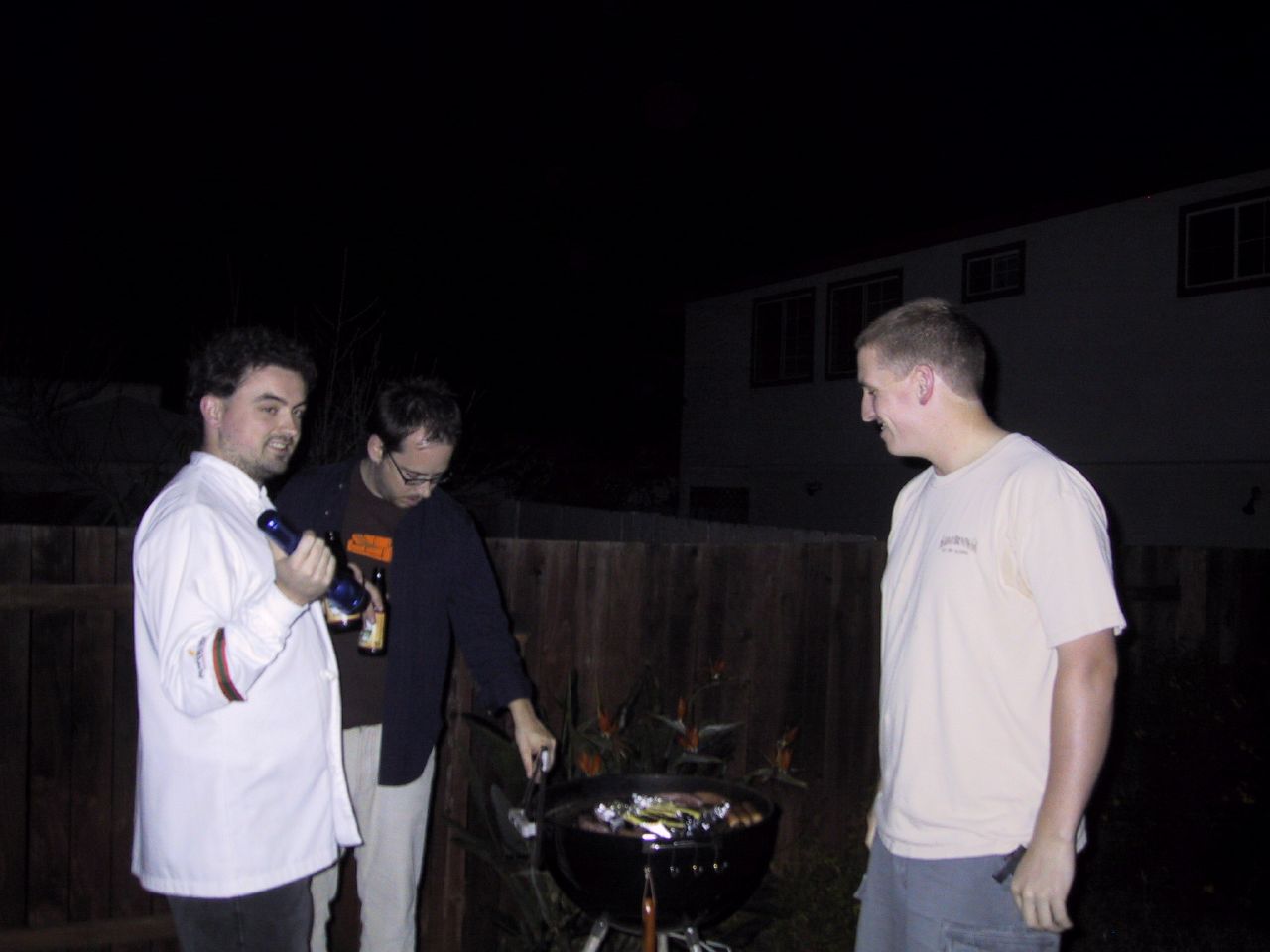 Ted, Patrick, and Doug prepare dinner