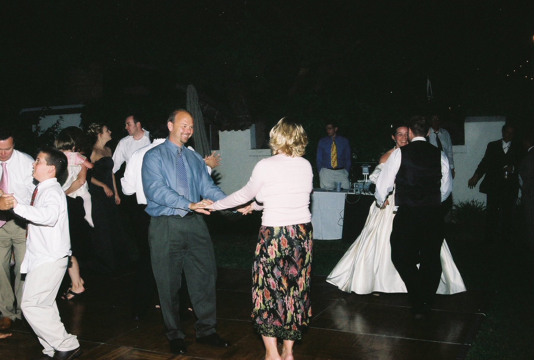 Erin dancing with Colin, and Colin dancing with Joy