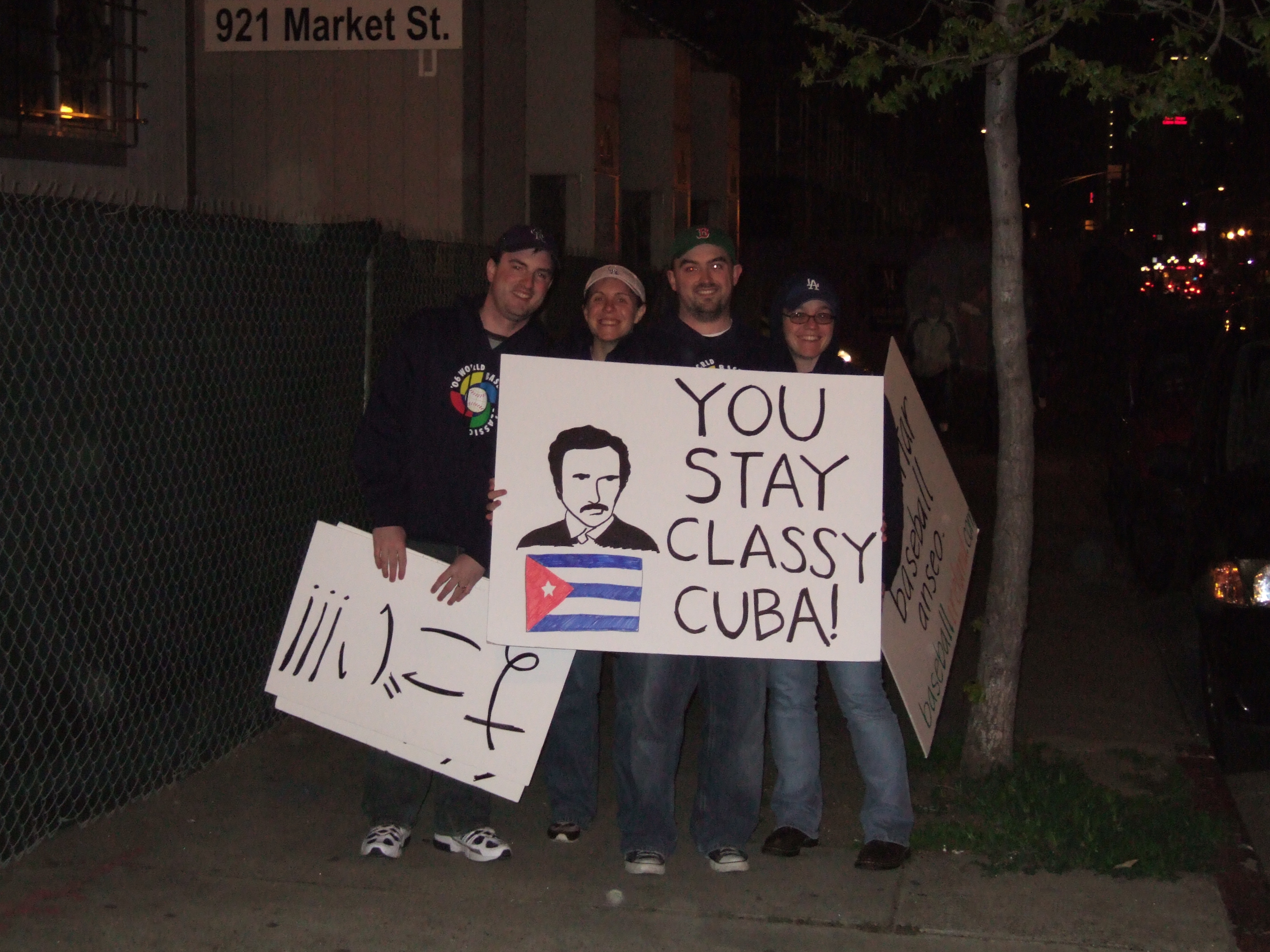Several people took pictures of us with the sign while we were walking back to the car after the game. This is one of them.