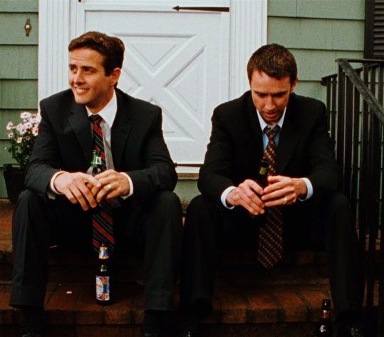 Joey McIntyre and some other guy, having a beer on my grandmother's front steps.
(Some scenes of <a href="http://www.onbroadwaythemovie.com/">On Broadway</a> were filmed in and around the house.)

Image from the movie's website.