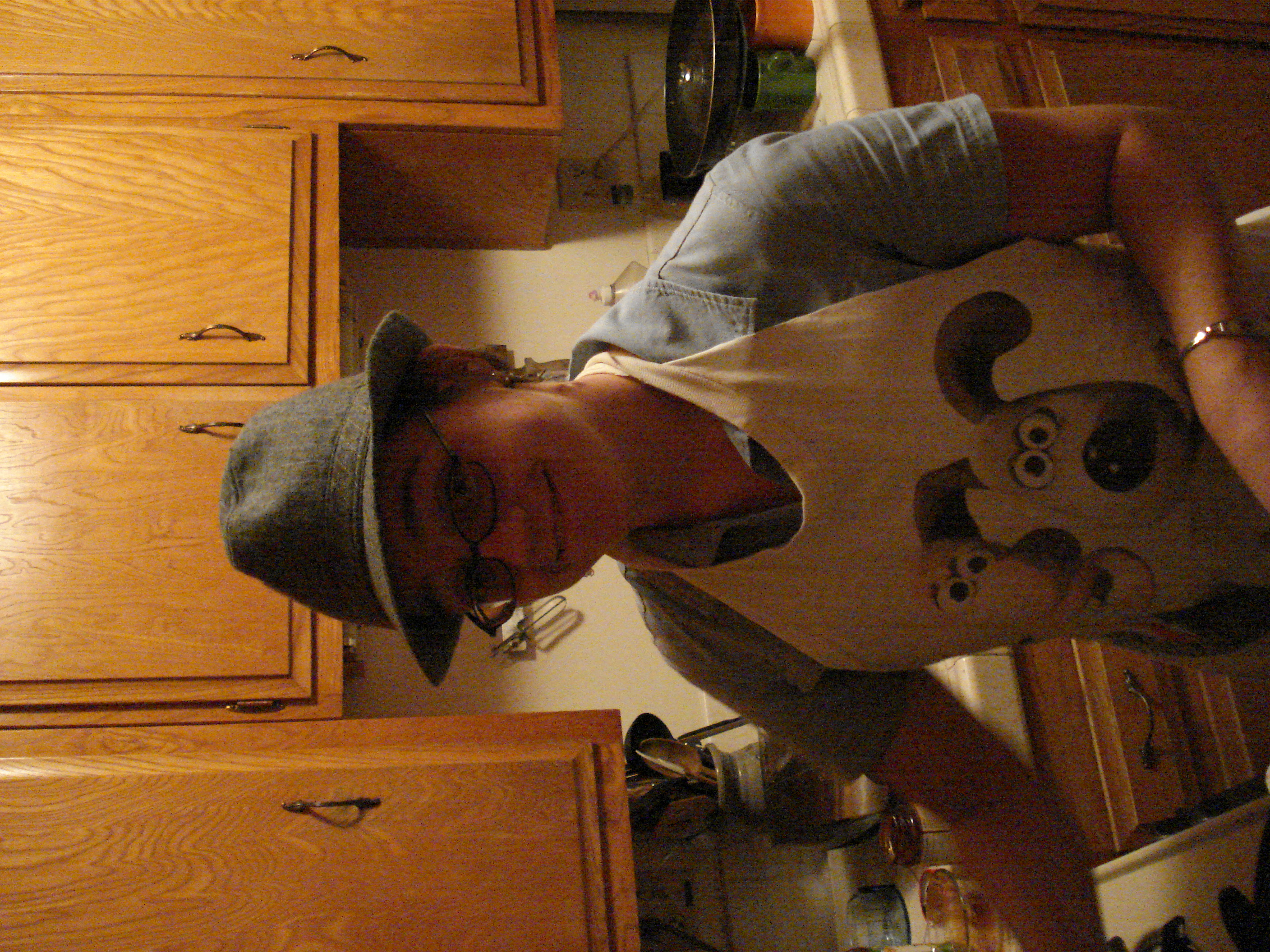 Erin, in awesome hat and apron