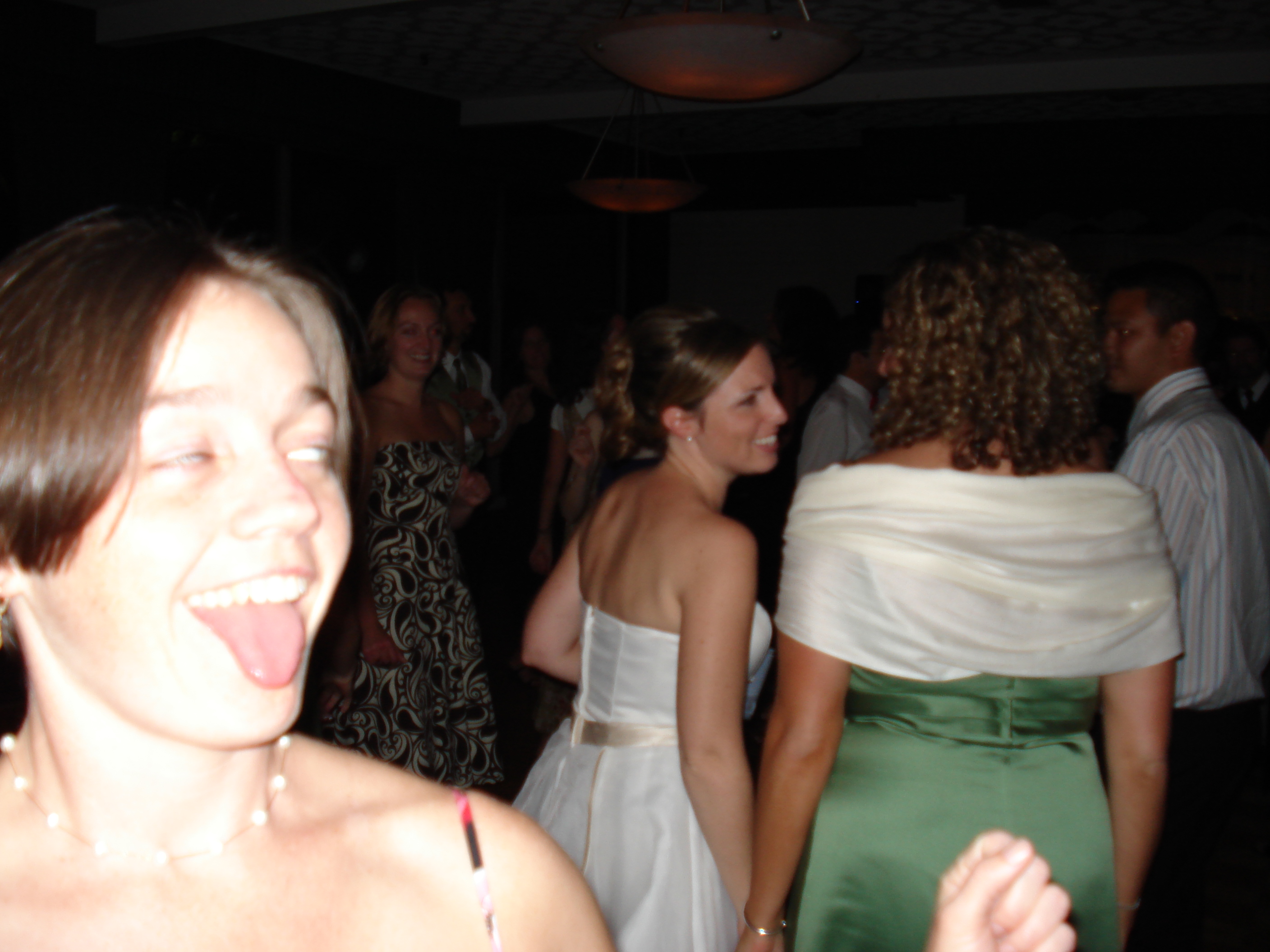 Making a ridiculous face while on the dance floor at Emily's wedding