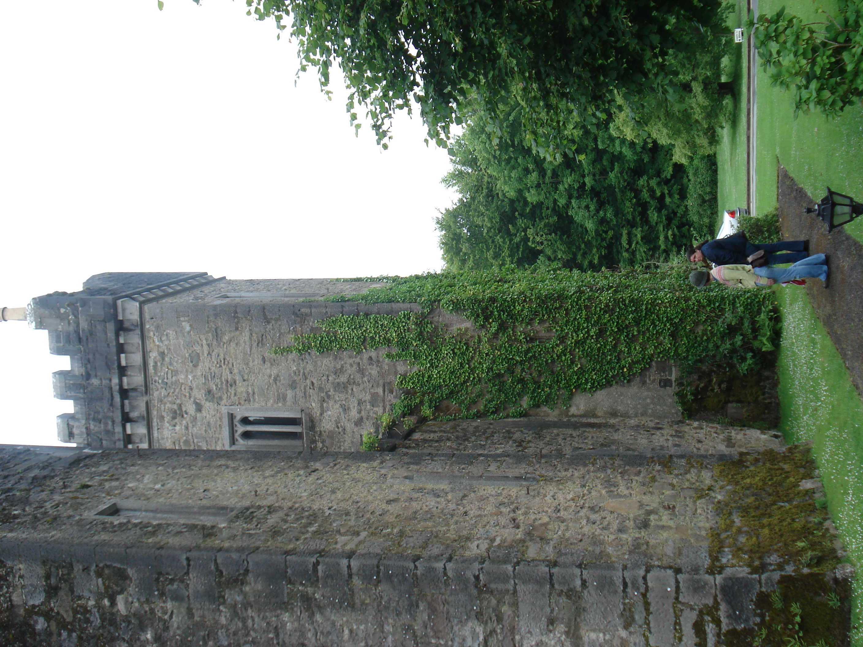 Erin and Kathleen check out the mossy castle walls