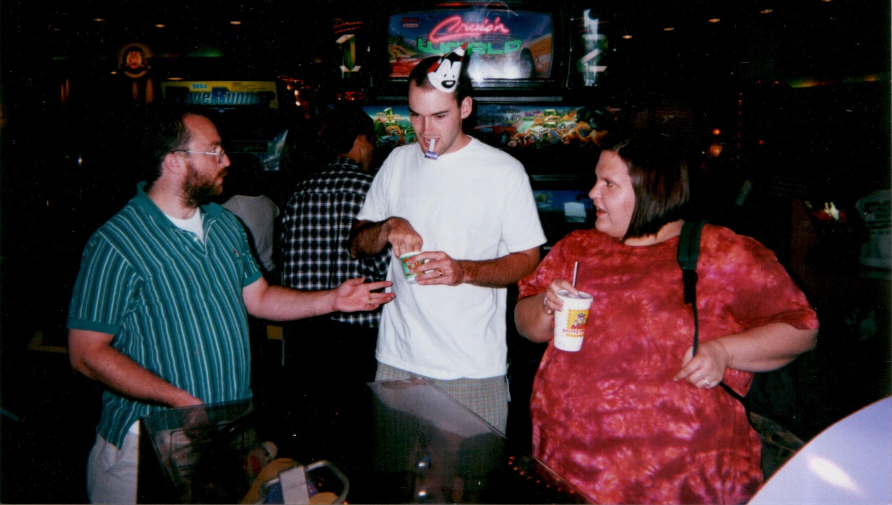 In the post-Nupedia-founding, pre-Wikipedia-founding timeframe.

L to R: Jimmy Wales, Jason Richey, and Liz Campeau.