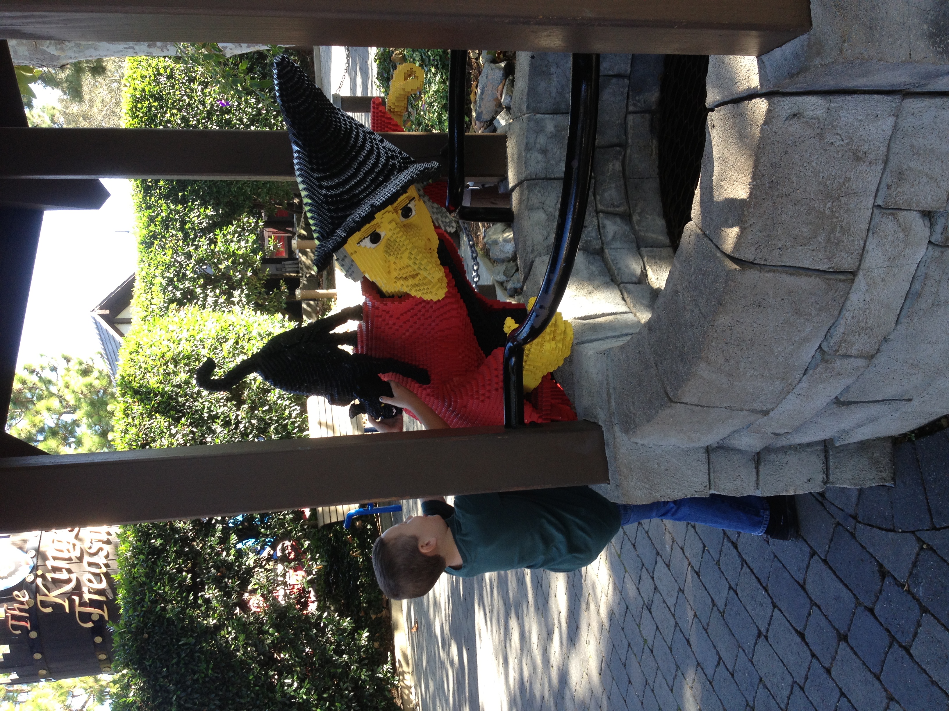 Andy with witch, cat, and well