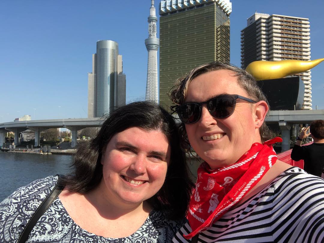 Two women pose for a selfie.