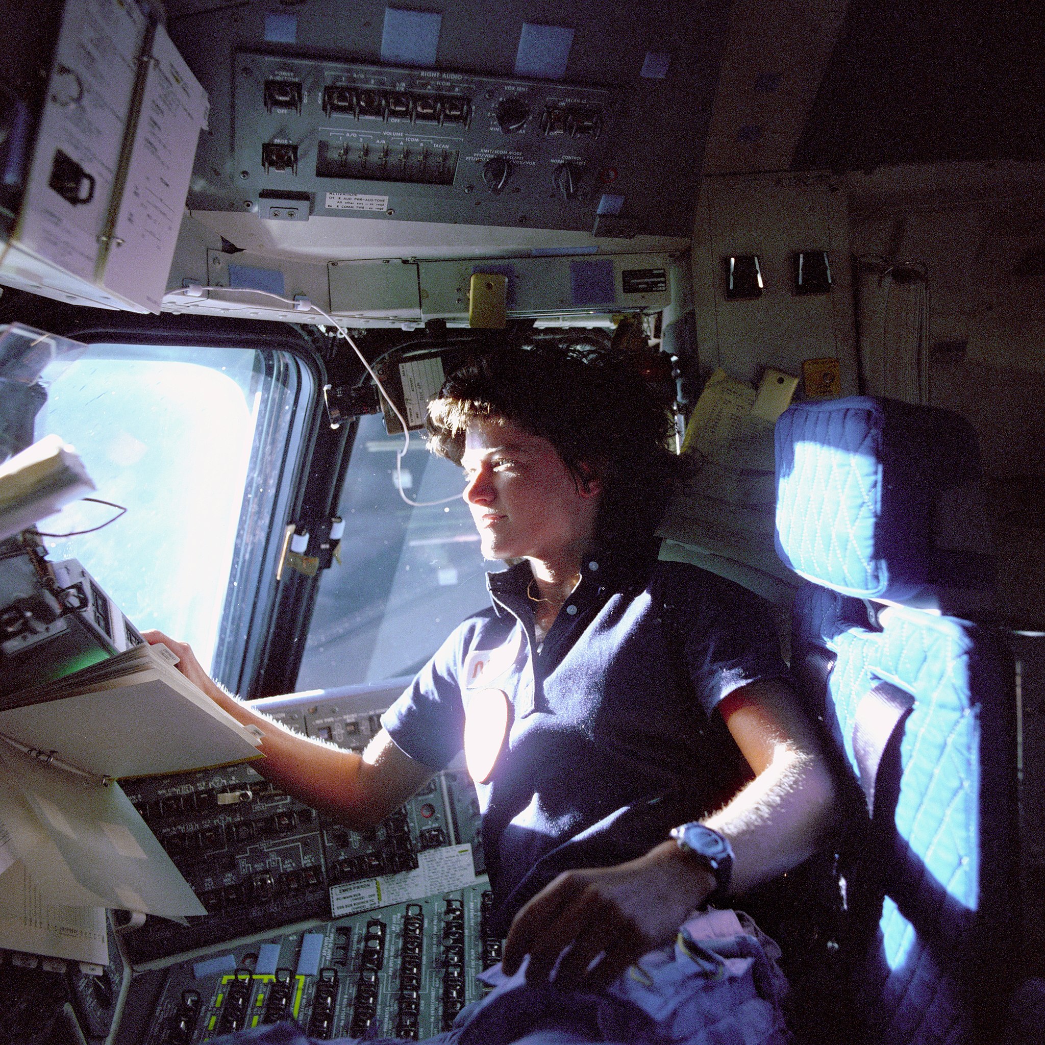 Sally Ride, first lesbian (and first American woman) in space, on the flight deck of the shuttle Challenger during STS-7 in June 1983. On her left wrist is a Seiko A829-6019.