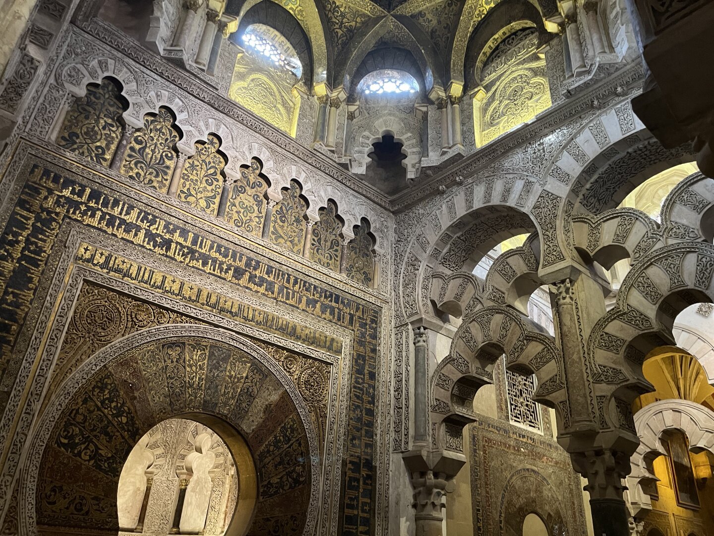 The arches and wall of the mihrab are more ornate than in the hypostyle.