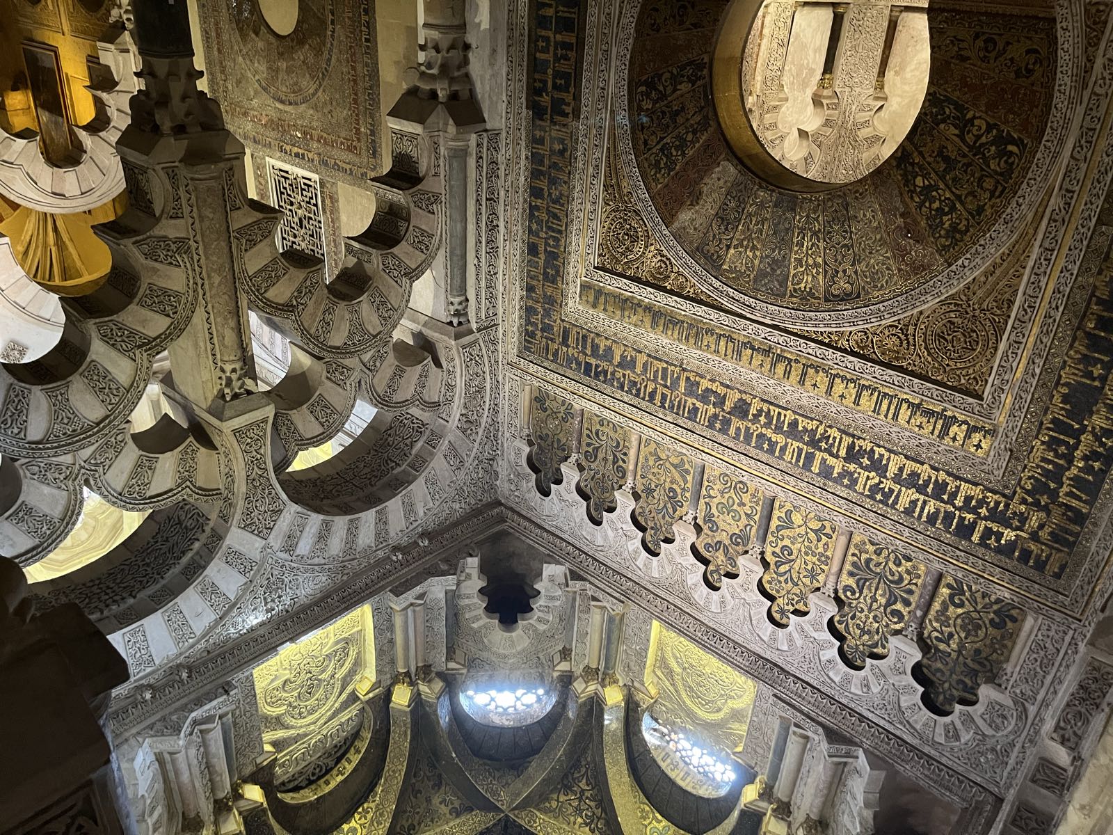 The arches and wall of the mihrab are more ornate than in the hypostyle.