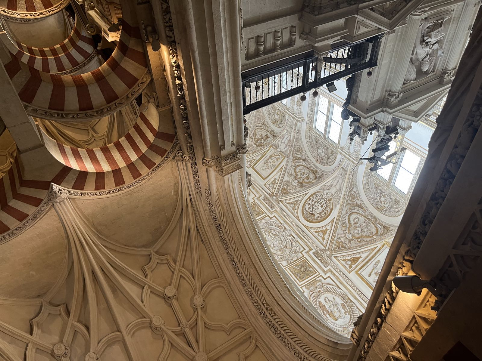 You can see the renaissance ceiling of the main cathedral juxtaposed with the Moorish double arches of the hypostyle just beyond it.