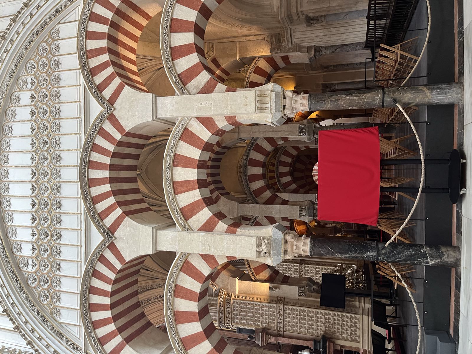 The intersection of the main renaissance cathedral with the Moorish arches of the hypostyle. One cathedral arch is as wide as three Moorish arches.