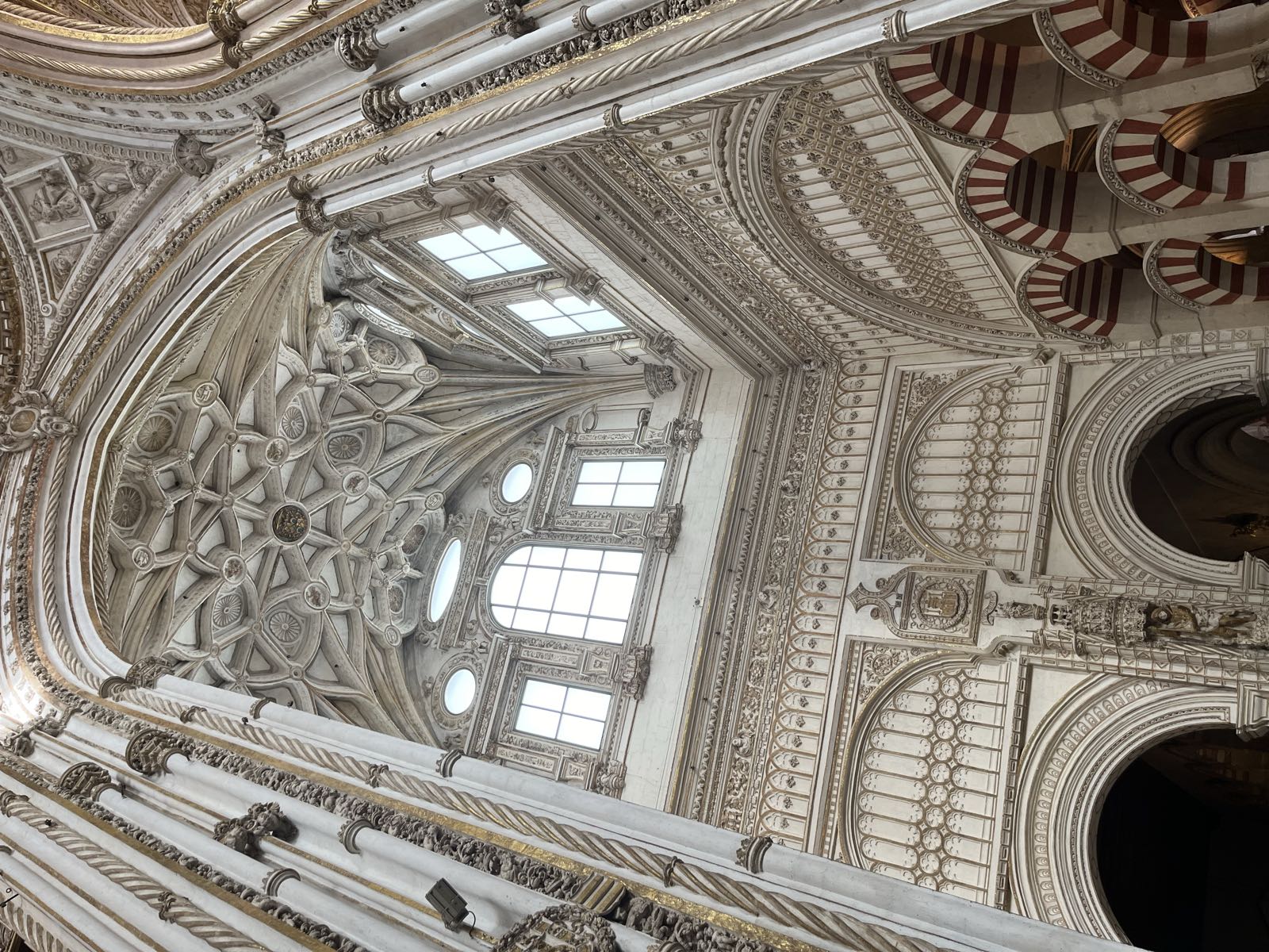 A strange angle that reveals the intersection of the main renaissance cathedral with the Moorish arches of the hypostyle.