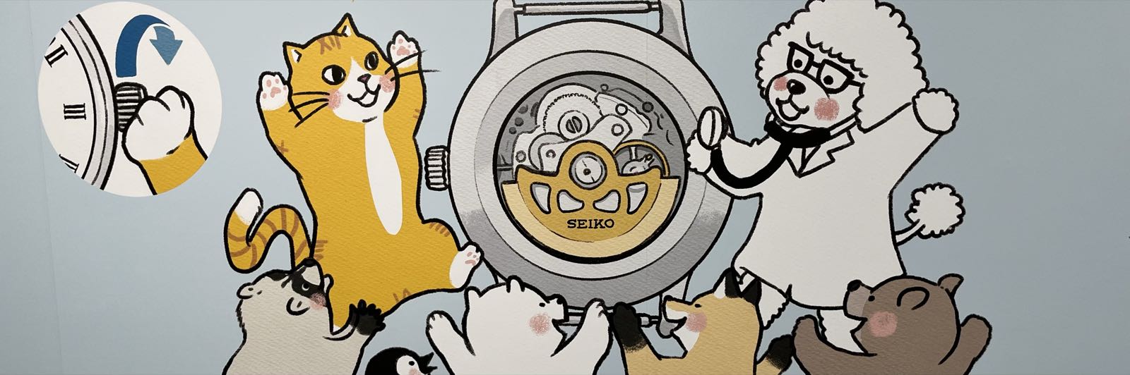 A sheep dressed like a doctor is examining a Seiko watch with a stethoscope. The doctor is joyous; apparently, they were able to repair the watch. There are a number of other animals standing around the watch. They are also celebrating.