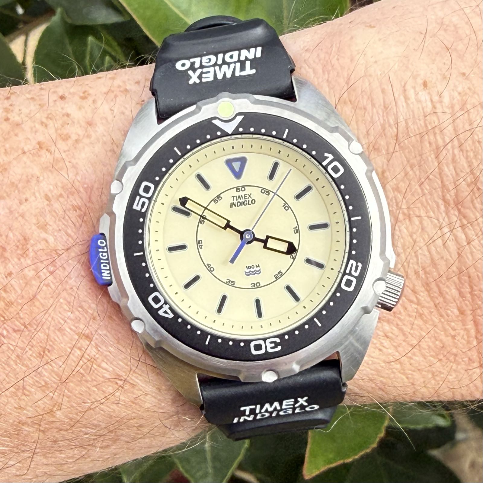 A steel dress watch on a steel bracelet. The face is baby blue, with steel Breguet numerals as hour markers.